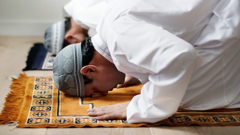 Muslim men praying during Ramadan